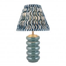 blue ceramic table lamp with blue ripple pattern shade
