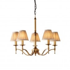 traditional 5 light chandelier in antique brass with shades
