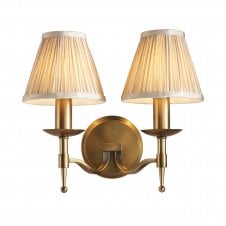 antique brass double wall light with beige shades