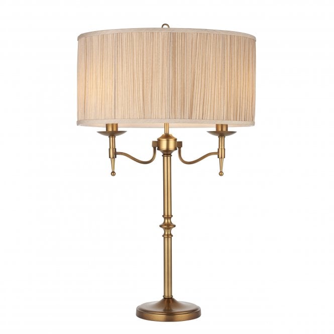 STANFORD two light antique brass table lamp with beige shade