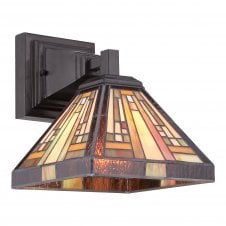 Geometric Tiffany wall sconce in bronze with warm amber tone shade