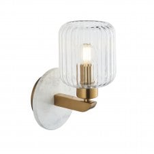 modern wall light with white volaskas marble accents