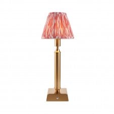 brass rechargeable table lamp with pink ikat pattern shade