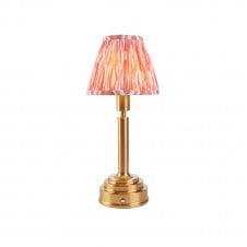 brass rechargeable table lamp with pink ikat pattern shade