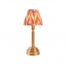 brass rechargeable table lamp with orange zigzag pattern shade