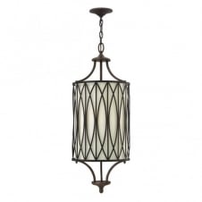 rustic ceiling pendant in bronze with patterned frame and fabric inner shade