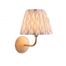 wood & brass wall light with neutral ikat pattern shade