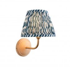 wood & brass wall light with blue ripple pattern shade